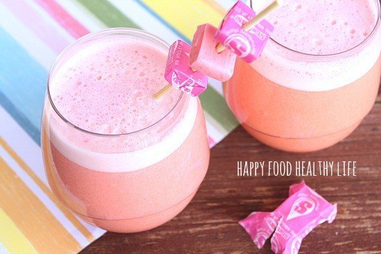 Pink Starburst Cocktail with Vodka .... tastes EXACTLY like everyone's favorite Starburst! And this drink has even been "lightened up" a bit on the calories! // Happy Food Healthy Life