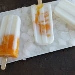Coconut Mango Popsicles - These refreshingly delicious treats will please both the kids and adults in your summertime festivities. Make one boozy batch and the other without! www.happyfoodhealthylife.com #alcohol #summer #popsicles