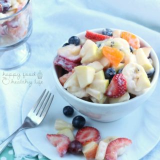 This TROPICAL FRUIT SALAD is absolutely addicting and fresh with a light tropical sauce. | www.happyfoodhealthylife.com