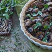 This Mushroom Spinach Tart is the perfect way to include a meatless dish at your next dinner. With a whole wheat crust and warm cheese, this tart is all comfort food!
