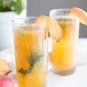 Find out how to make a Peach Basil Whiskey Cocktail right from your own DIY Herb Garden. Talk about refreshing for the warm months of summer!
