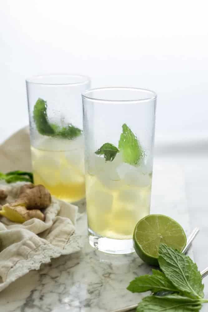 GINGER LIME REFRESHER - A cool and refreshing drink that will remind of you of a classic mojito, with a hint of ginger. With less sugar and zero alcohol, this mocktail is a beverage you can sip on all day long!