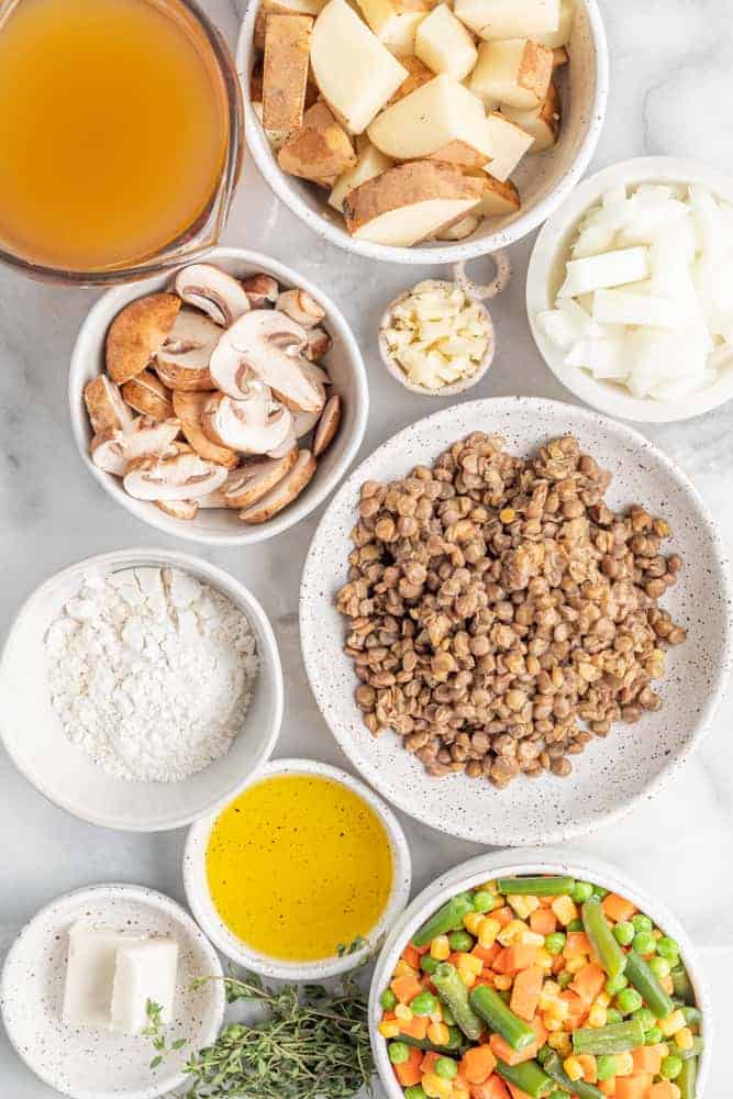 ingredients needed for vegetarian pot pie in separate bowls