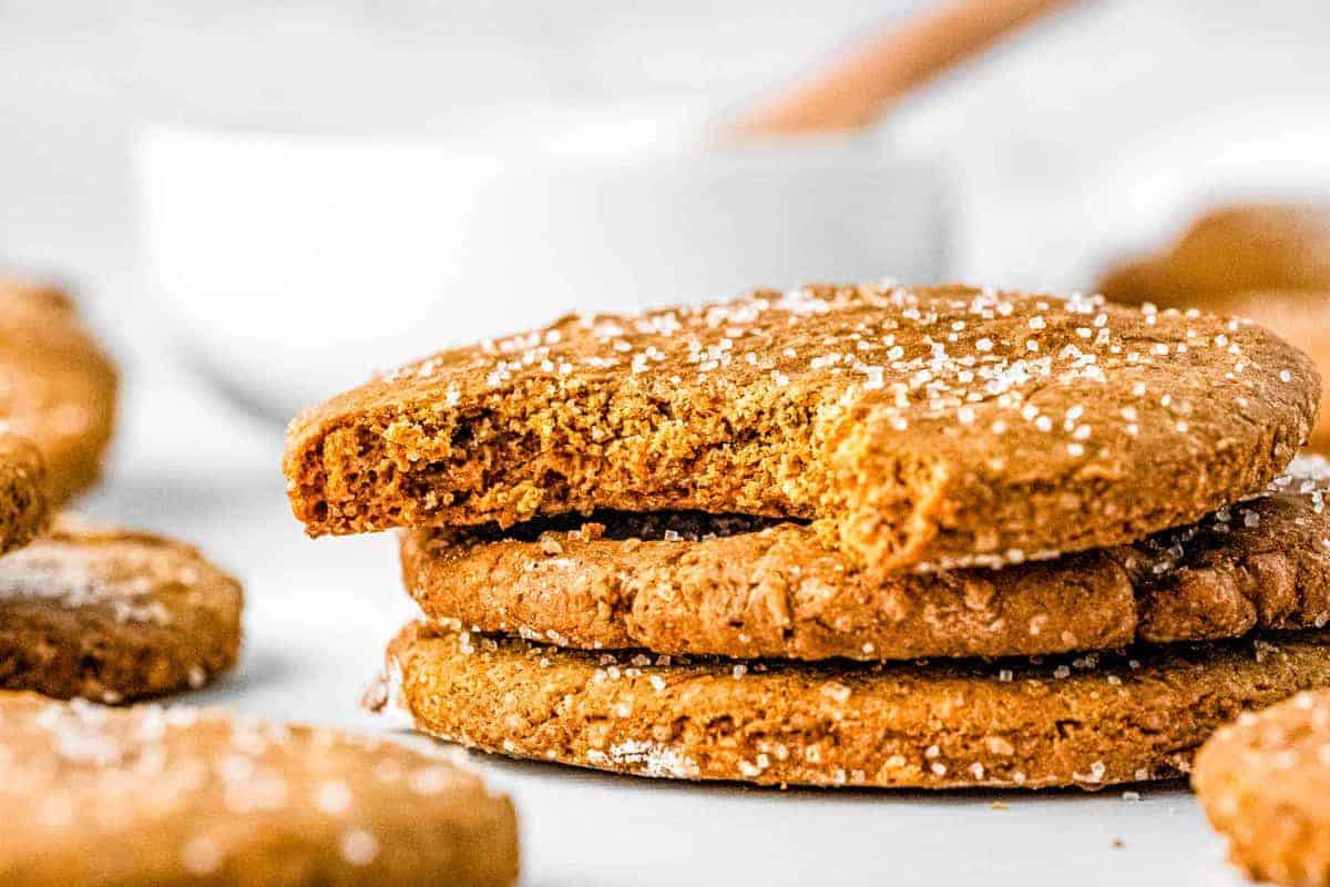 bite taken out of stack of gingerbread cookies