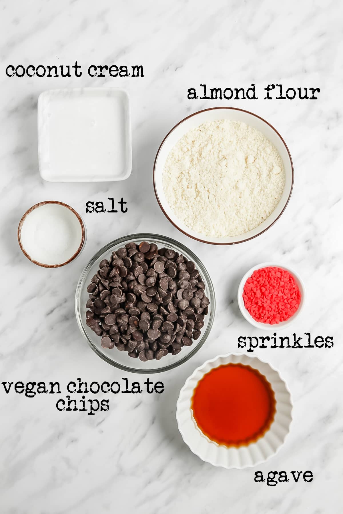 overhead image of all ingredients needed for chocolate balls, labeled with text.