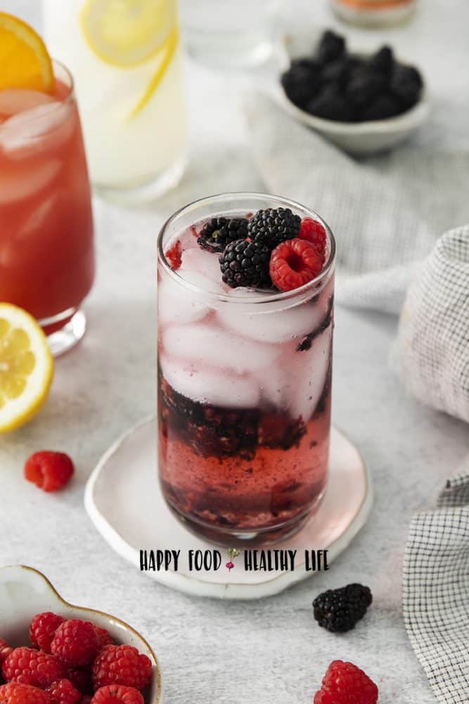 citrus berry simple vodka drink with fresh berries, and lemon lime soda